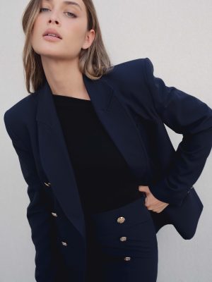 FALDA MIDI BOTONES DORADOS